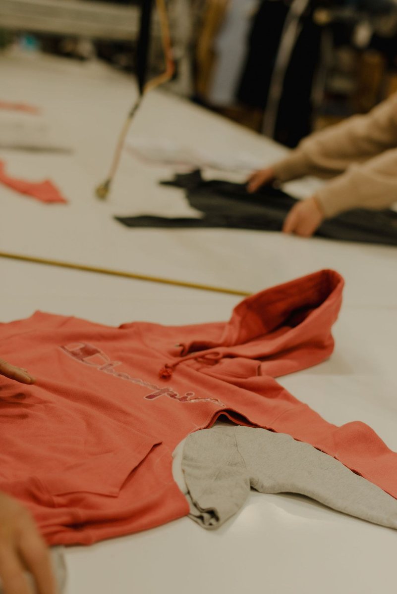 Garments being cut on the cutting table