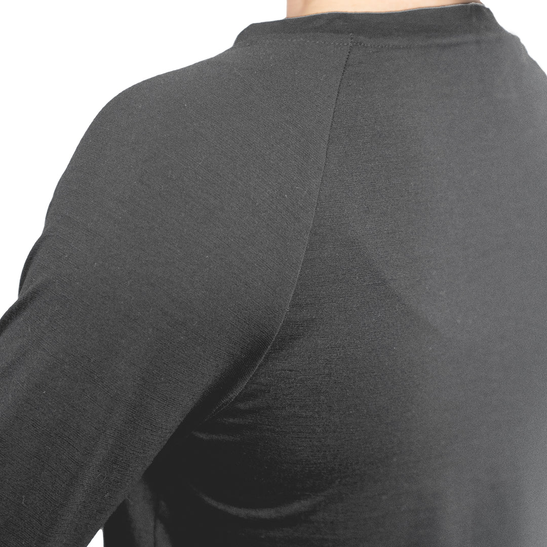 Shoulder shot of Ottie Merino wool thermal top in Charcoal Marle colour